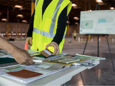 Workers in a warehouse construction project