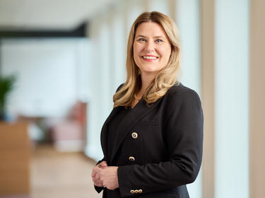 Danielle van der Lem standing in an office